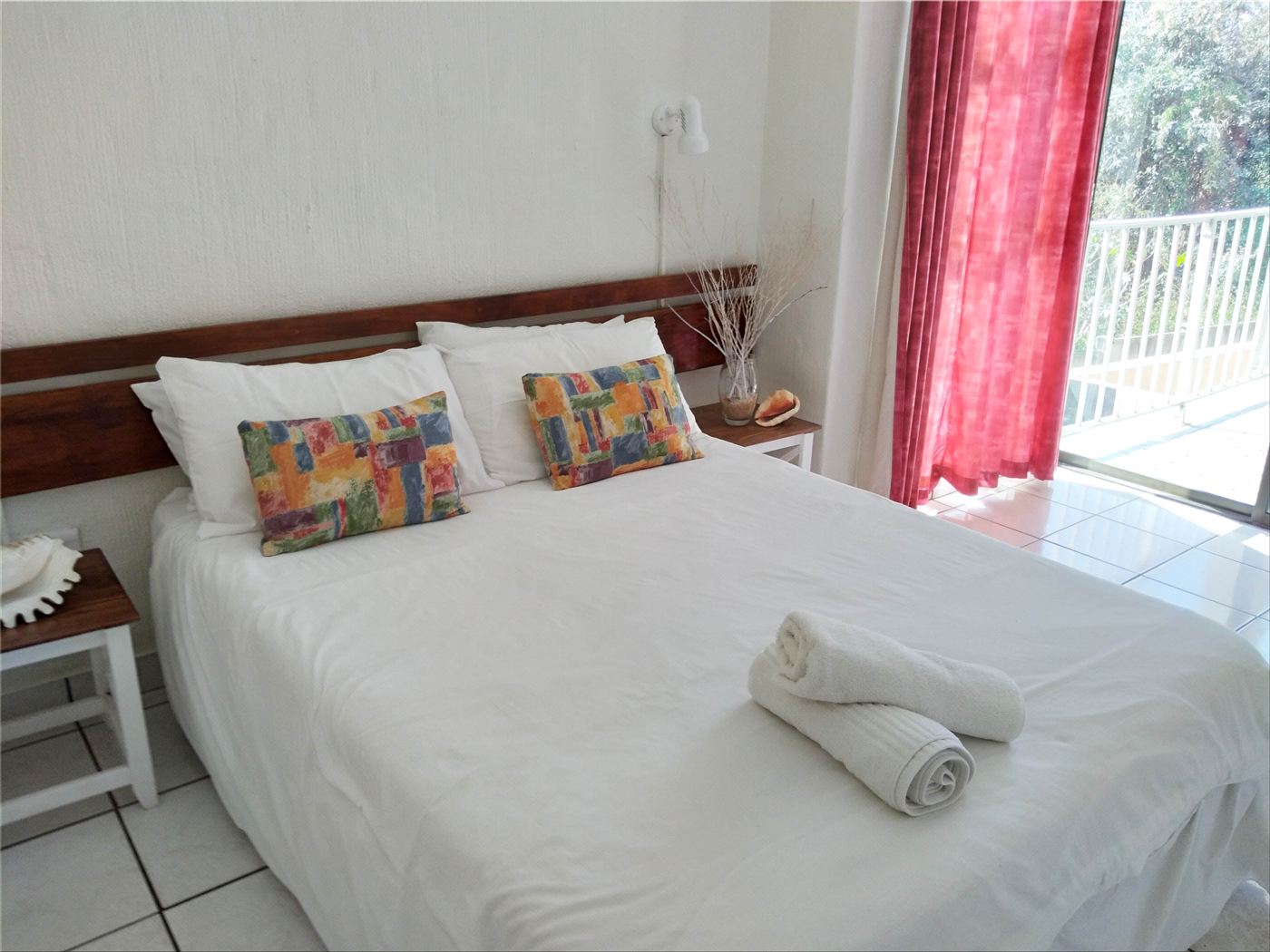 Main bedroom with balcony